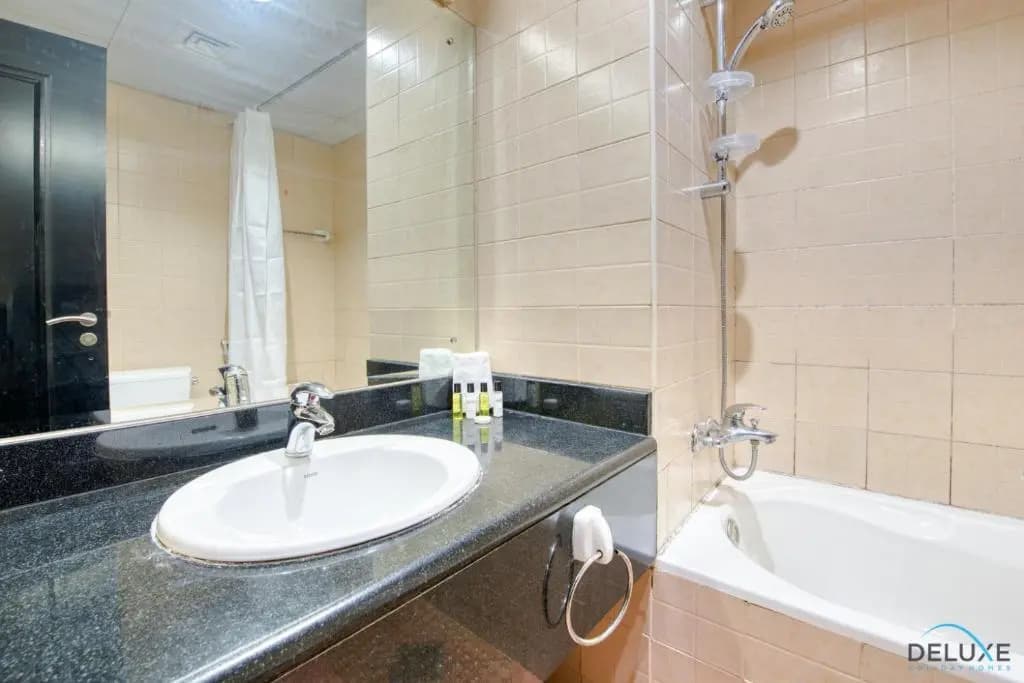 Restful 1BR at Mediterranean Discovery Gardens by Deluxe Holiday Homes 7